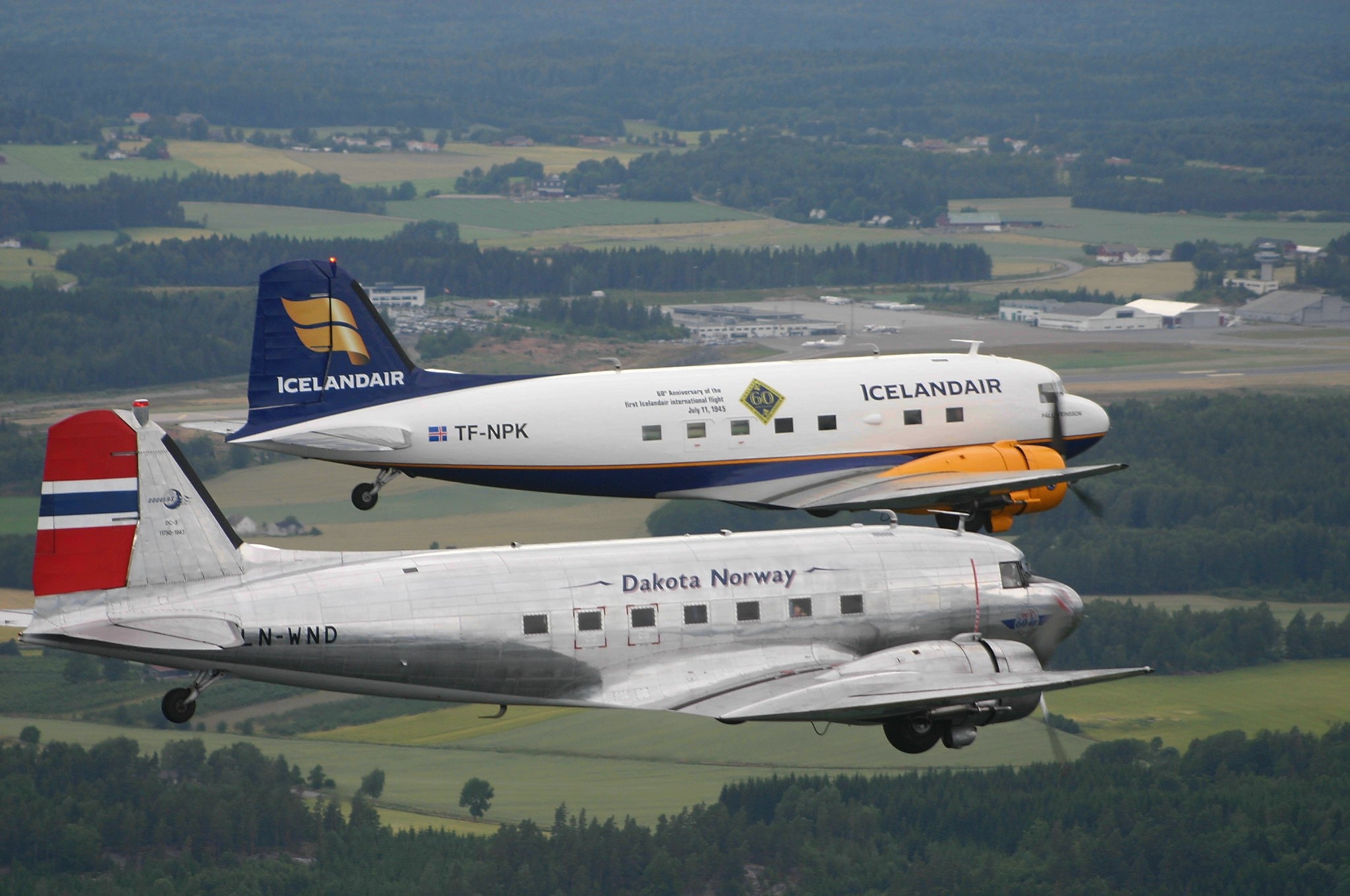 Icelandic DC-3 TF-NPK and Norwegian LN-WND during formation flight over Sandefjörd, Norway // Source: Tómas Dagur Helgason