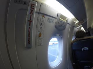 The emergency exit sign in Eagle Air Dornier Do328