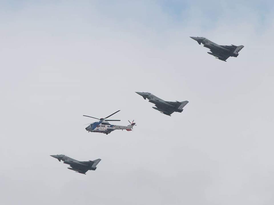 Formation flight over Reykjavik of Icelandic Coast Guard helicopter Aerospatiale AS332L1 reg. TF-LIF with Italian Air Force jet fighters // Source: Flugblogg's source